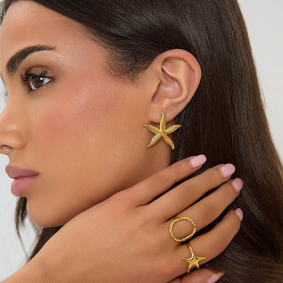 18K GOLDEN SEESTERNE OHRRINGE