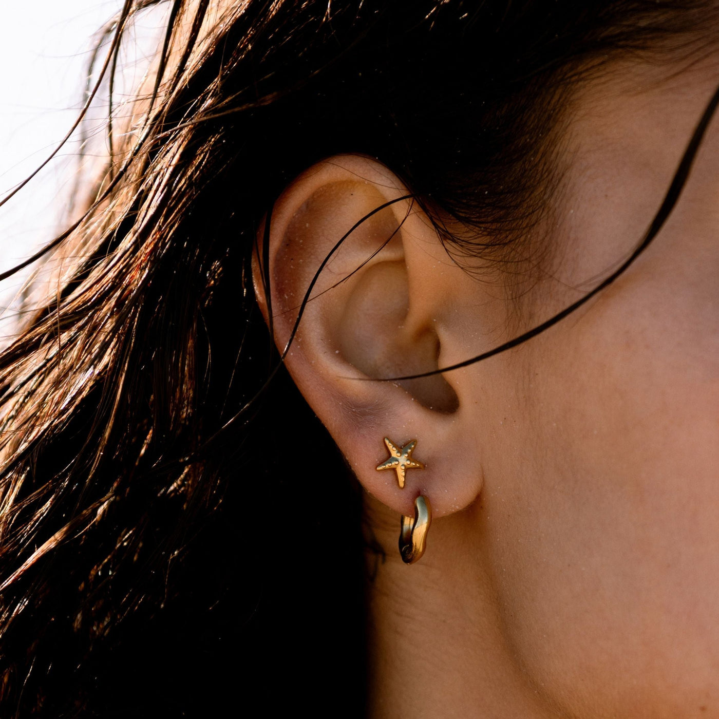 Wellenförmige Creolen