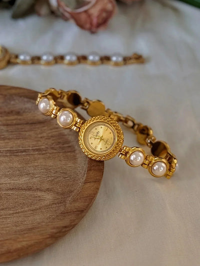 Anara Damenuhr - Elegantes goldenes Quarz-Zeitmessgerät mit Perleneinlage