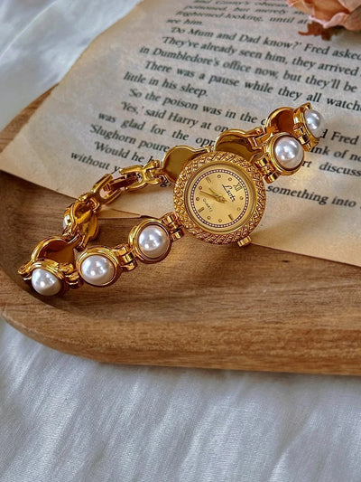 Anara Damenuhr - Elegantes goldenes Quarz-Zeitmessgerät mit Perleneinlage